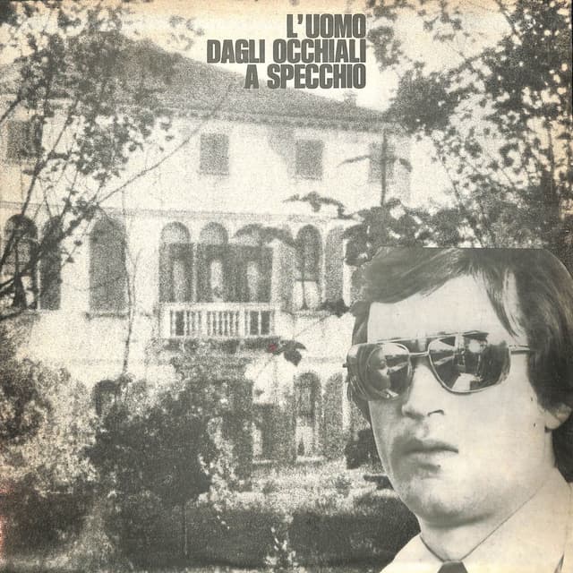 L'uomo dagli occhiali a specchio